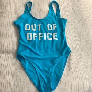 NWOT Out of Office bright blue one piece with low back